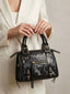Borsa a mano con borchie e zip - Follie by Alice
