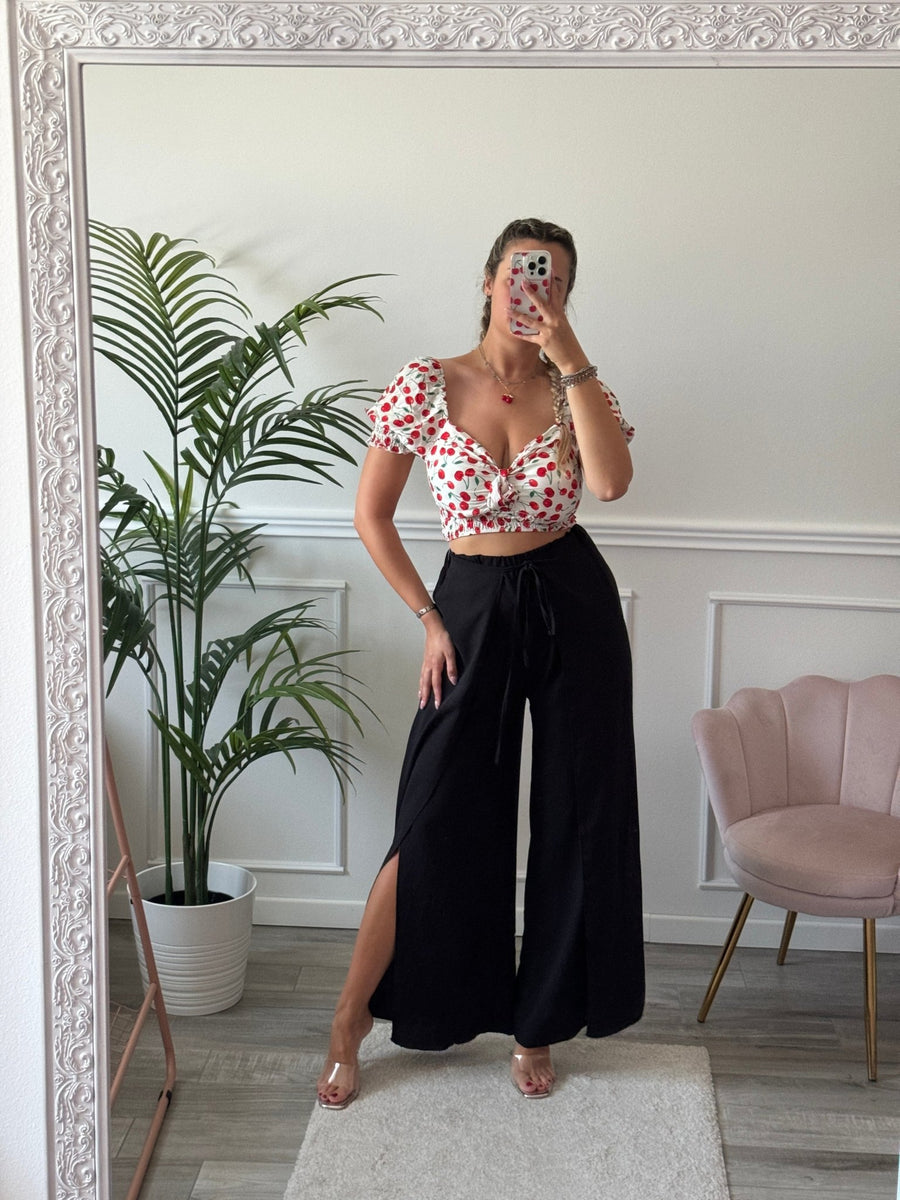 Pantaloni ampi effetto lino con spacchi