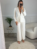 Pantaloni a palazzo con ricami floreali e paillettes