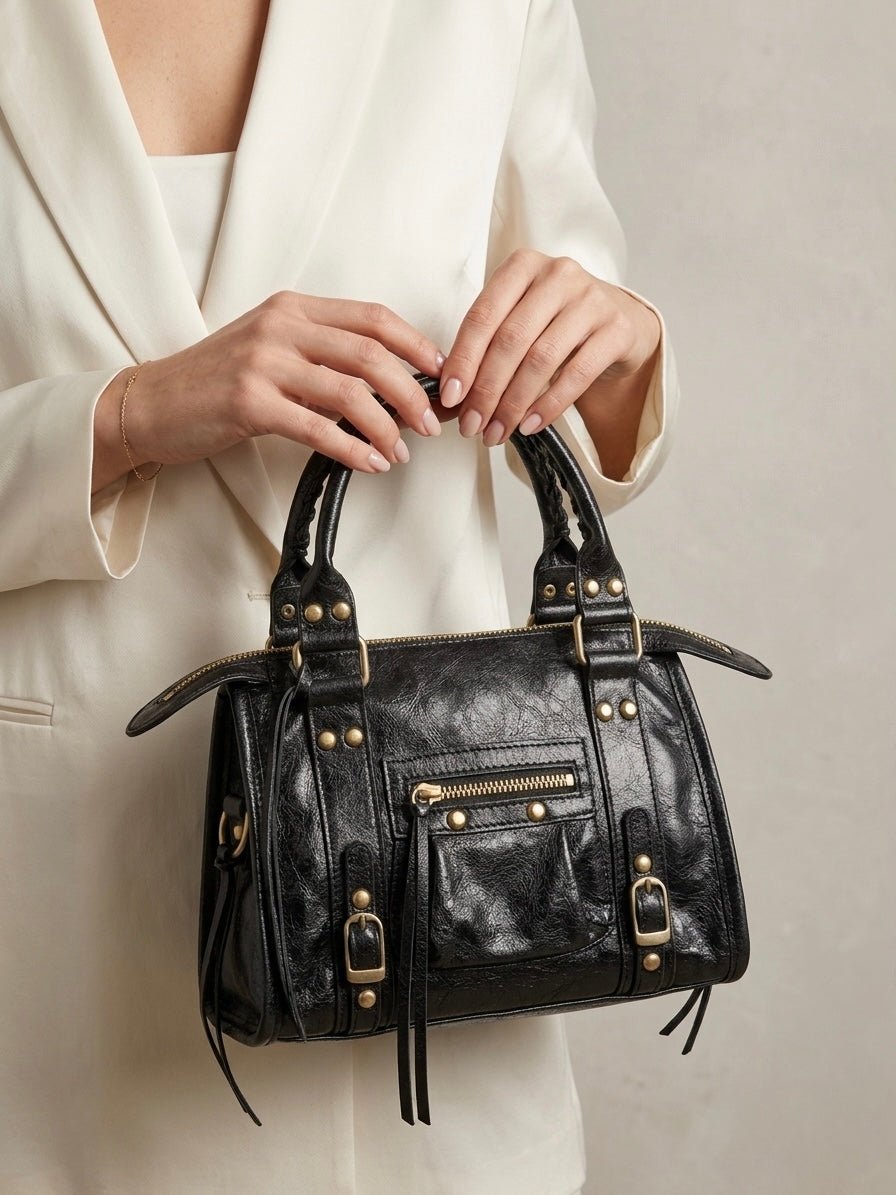 Borsa a mano con borchie e zip - Follie by Alice Immagine principale del prodotto