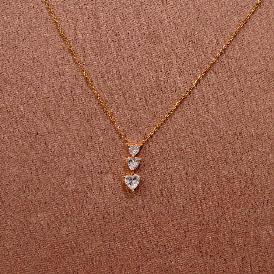 Collana oro con cuoricini pendenti brillanti – alternate