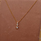 Collana oro con cuoricini pendenti brillanti
