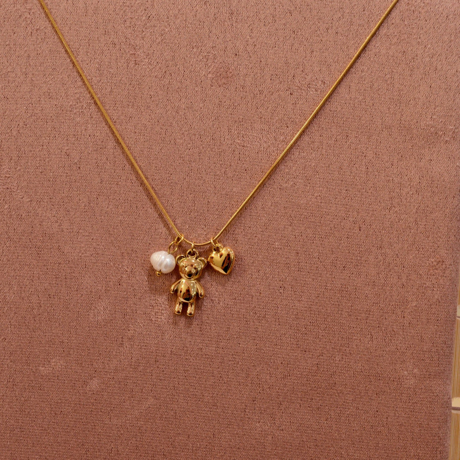 Collana oro con orsetto, cuoricino e perla bianca – alternate
