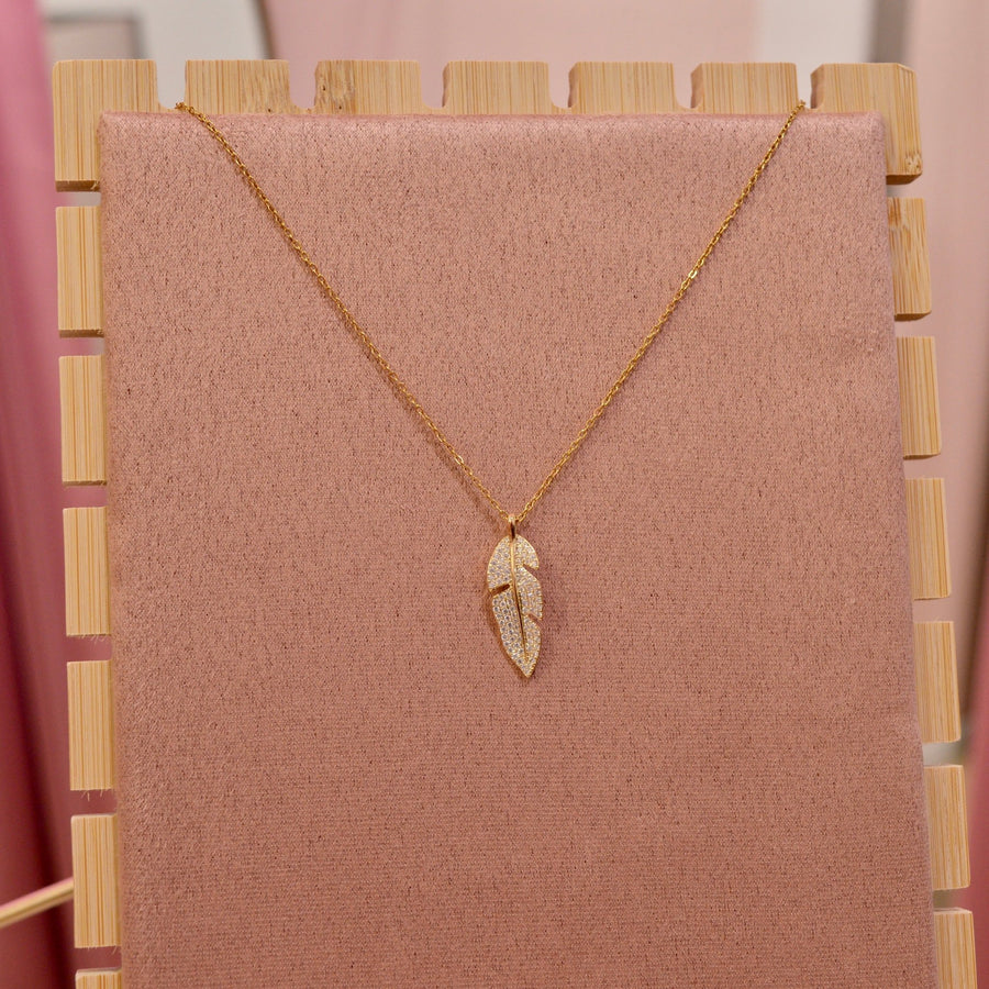 Collana oro con piuma con strass gioiello – alternate