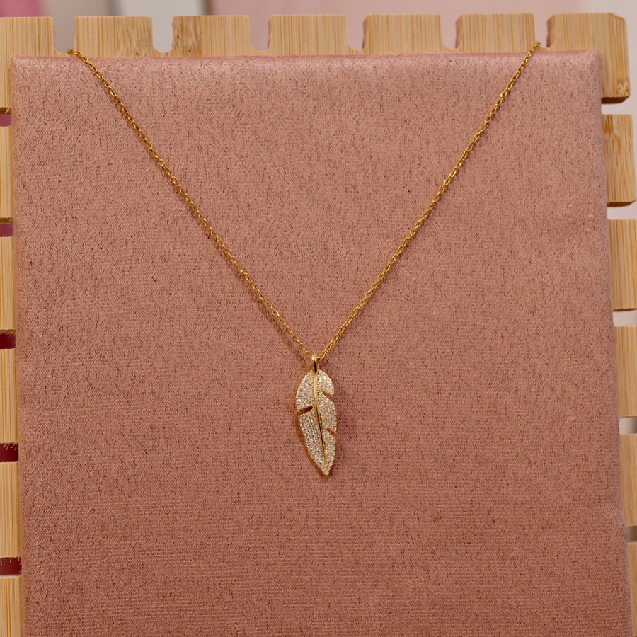 Collana oro con piuma con strass gioiello