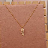 Collana oro con piuma con strass gioiello