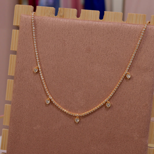 Collana tennis oro con cuori gioiello pendenti