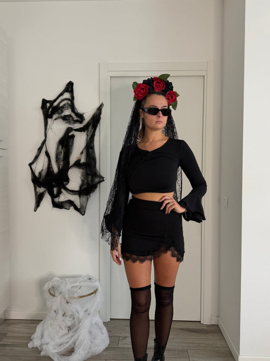 Maglia con maniche lunghe a campana e chiusura asimmetrica con bottoncini - Follie by Alice 1536