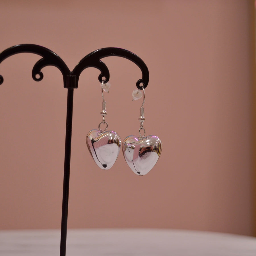 Orecchini argento con maxi cuori pendenti – alternate