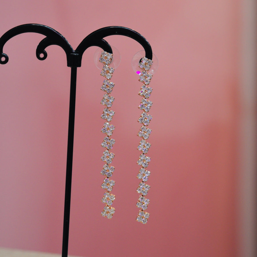 Orecchini oro rosa pendenti con strass gioiello – alternate