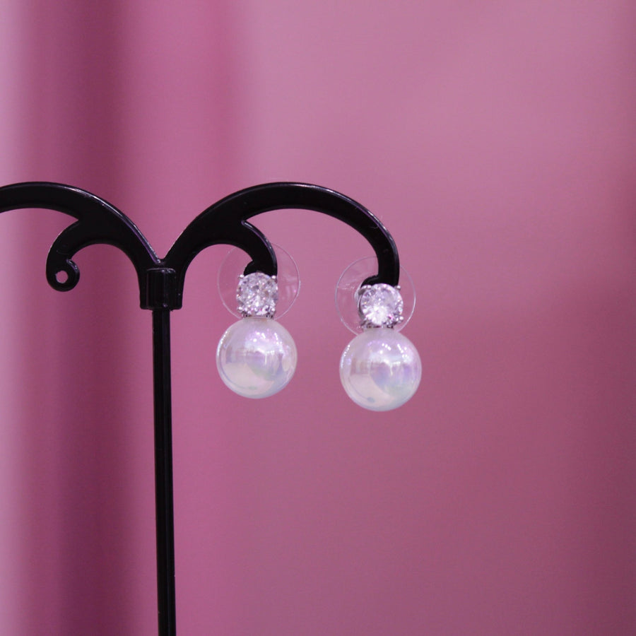 Orecchini con brillante e perla bianca