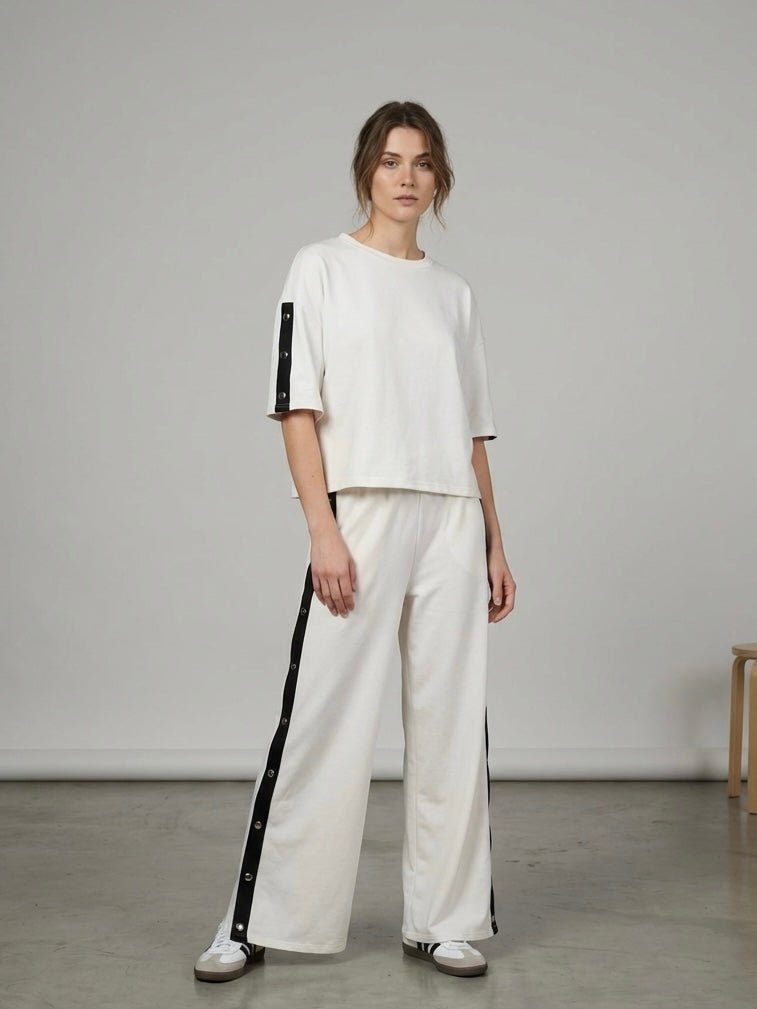 Pantaloni a palazzo con banda laterale e bottoncini - Follie by Alice