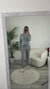 Set completo con maglione collo alto con spacchi e pantaloni oversize