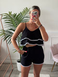 Shorts effetto lino con orlo a contrasto