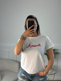 T-shirt bianca con ricamo Amour