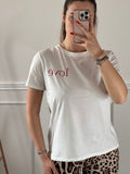 T-shirt bianca con ricamo Love