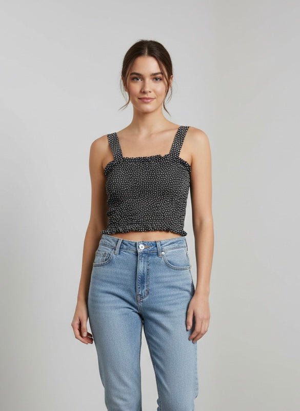 Top nero a pois elasticizzato
