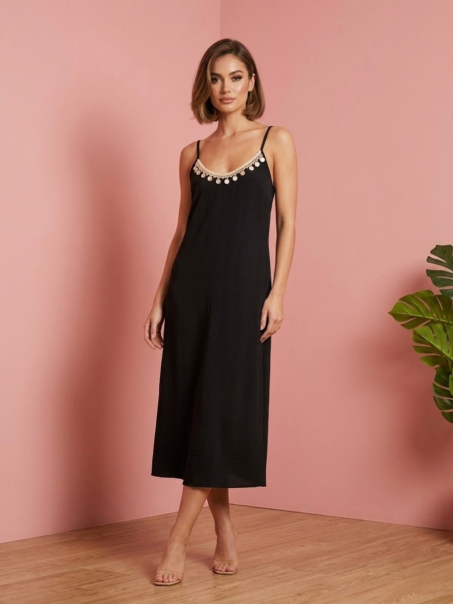 Vestito lungo con pendagli