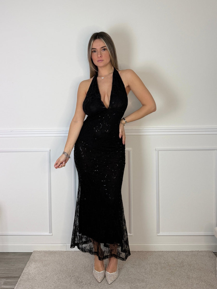 Vestito lungo in tulle con paillettes e schiena scoperta