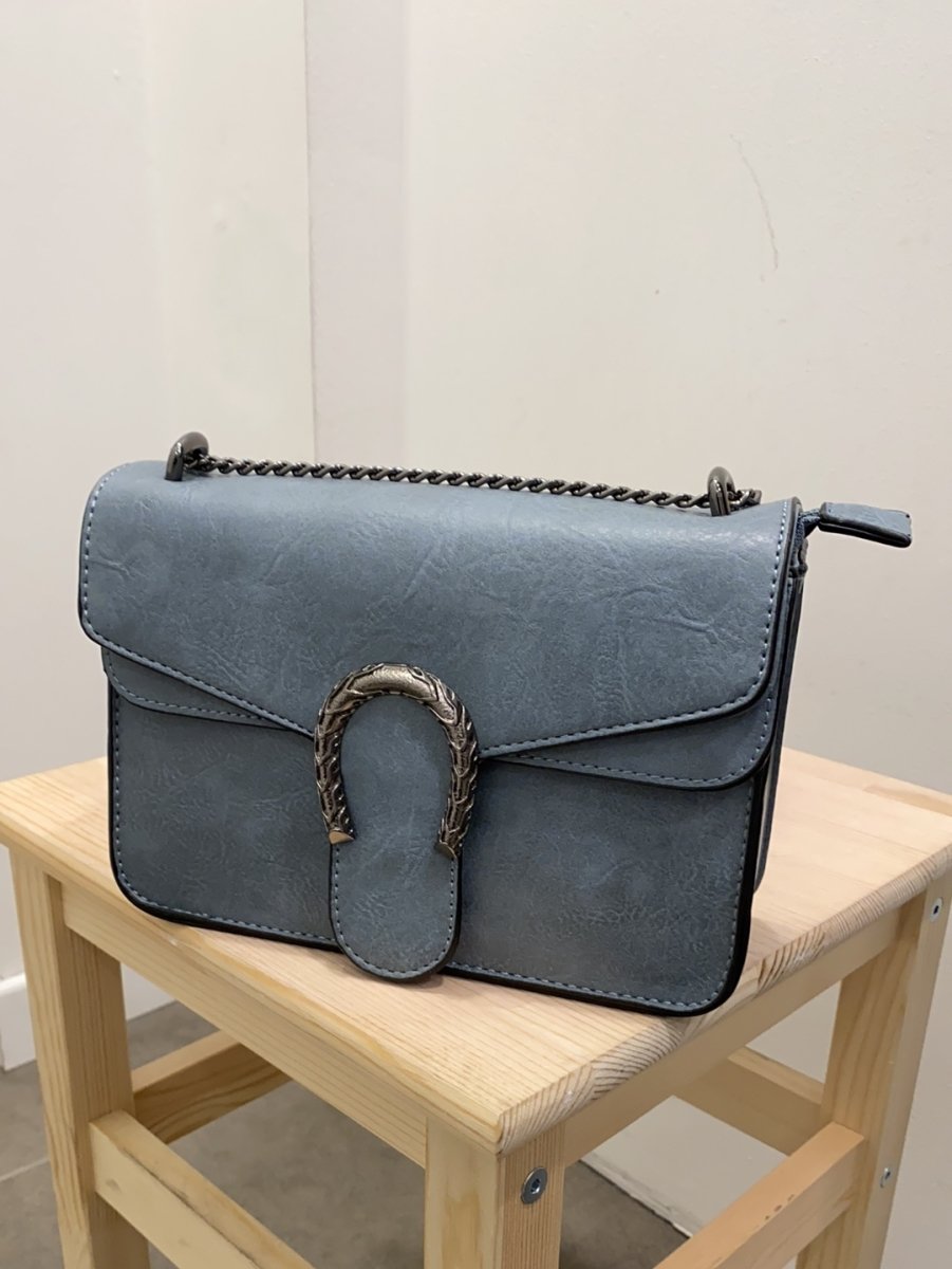 Borsa azzurra con dettaglio argento a ferro di cavallo - Follie by Alice