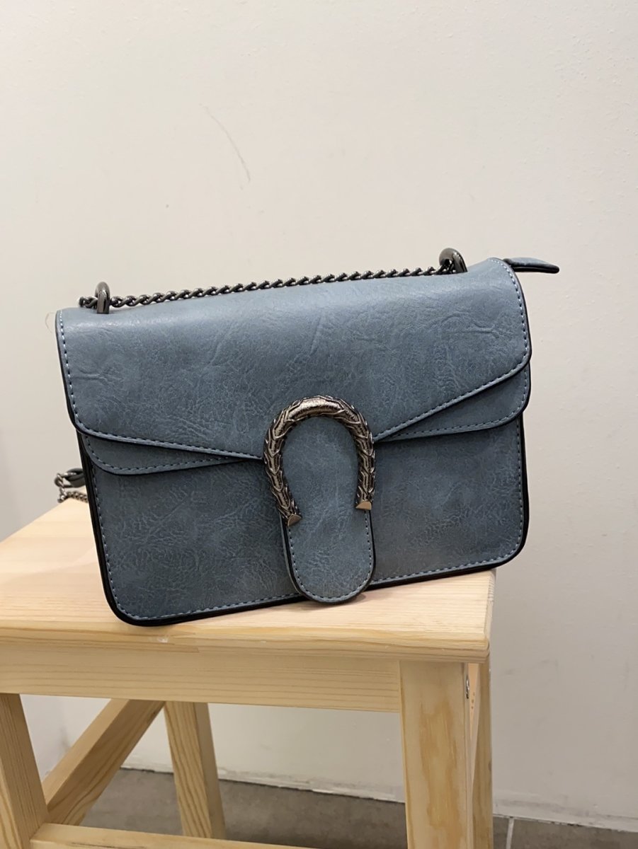 Borsa azzurra con dettaglio argento a ferro di cavallo - Follie by Alice