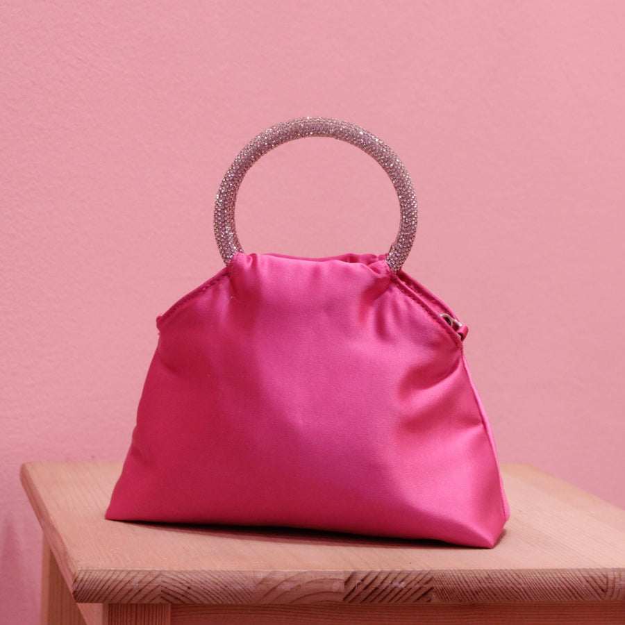 Borsa puffer in raso fucsia con manici gioiello
