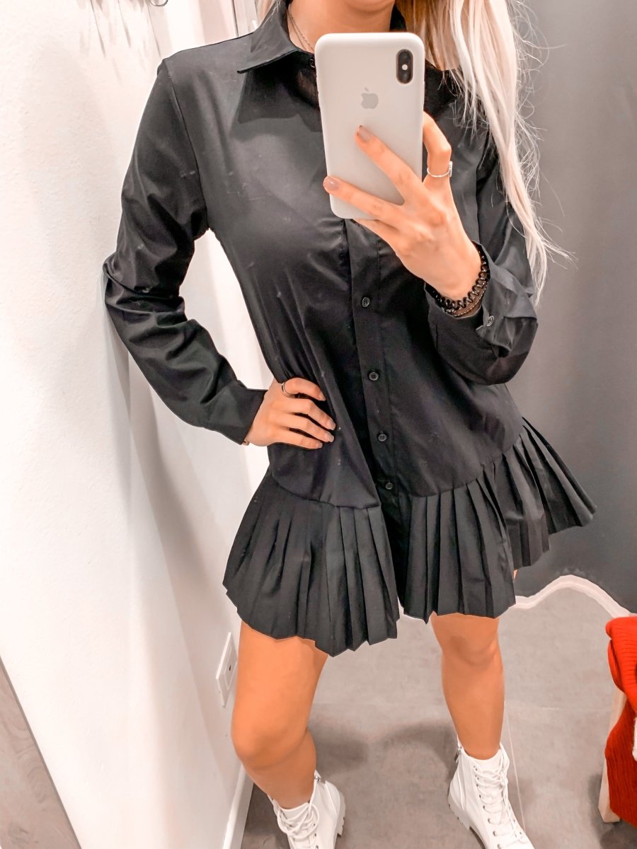 Camicia nera lunga con orlo plissettato