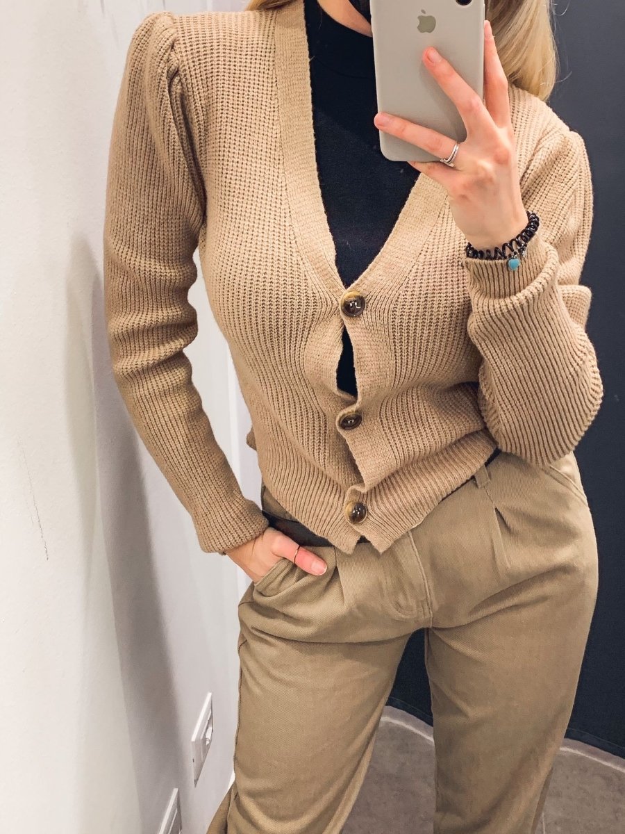 Cardigan beige in maglia con bordi a coste