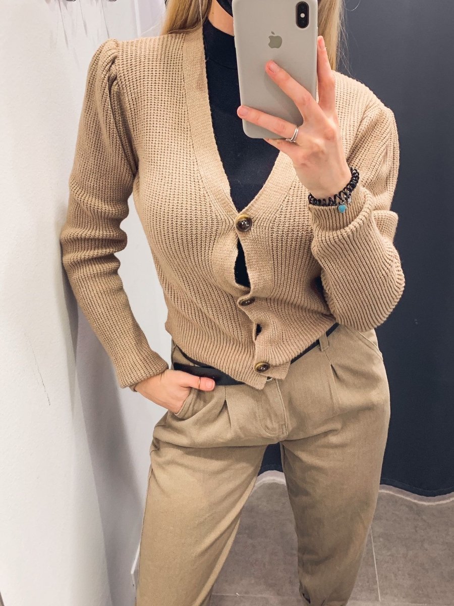 Cardigan beige in maglia con bordi a coste