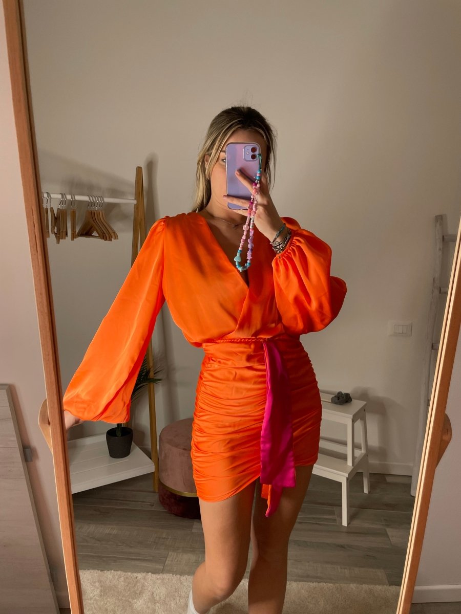 Gonna arancione drappeggiata con fiocco