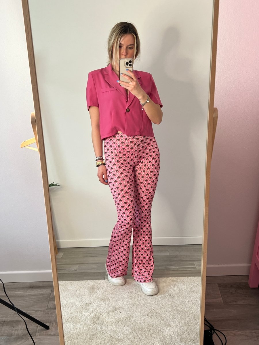 Pantaloni rosa a zampa con fantasia – alternate