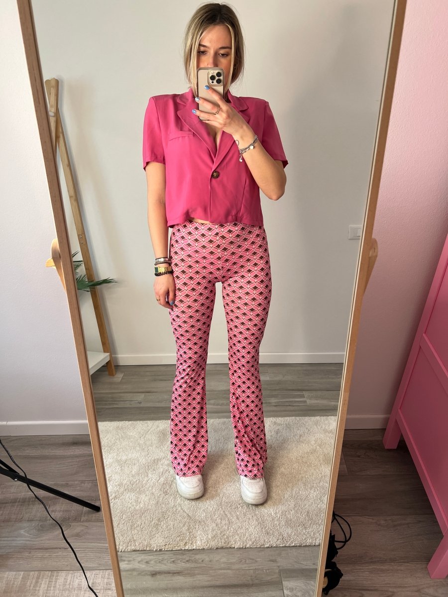 Pantaloni rosa a zampa con fantasia - Follie by Alice
