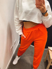 Pantaloni tuta arancioni con fondo elastico - Follie by Alice