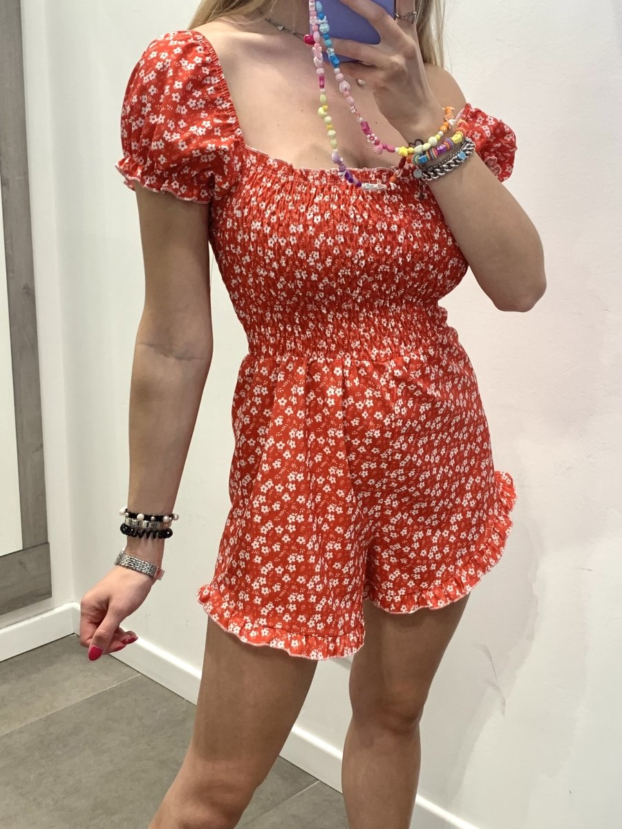 Tutina rossa elasticizzata a fiorellini – alternate